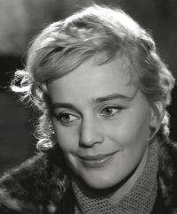 Ein Foto aus dem Jahr 1957, auf dem Maria Schell lächelt.