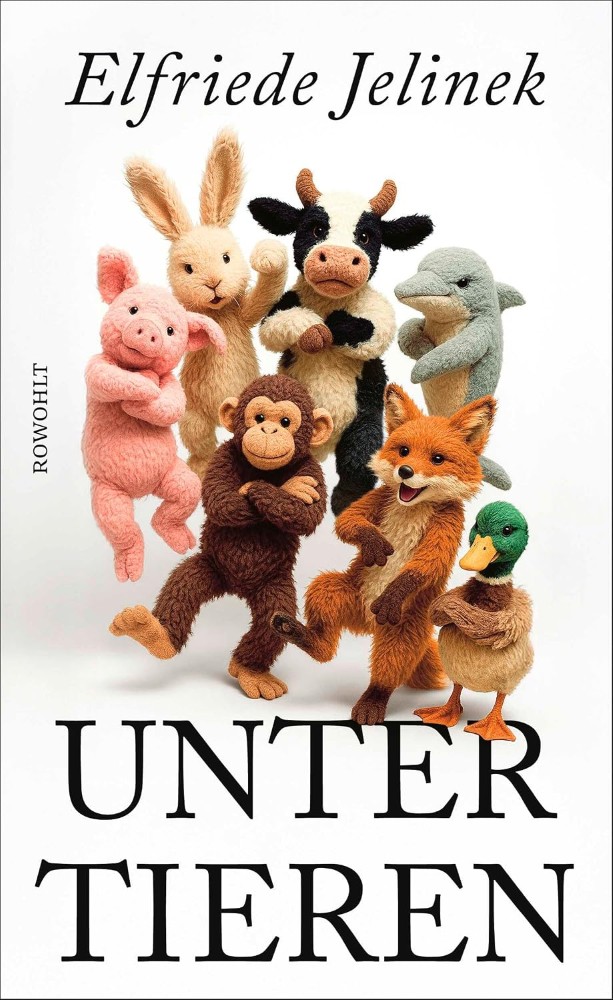 Mehrere Stofftiere, unter anderem ein Affe, ein Fuchs, eine Ente, ein Schwein, ein Delfin und eine Kuh.
